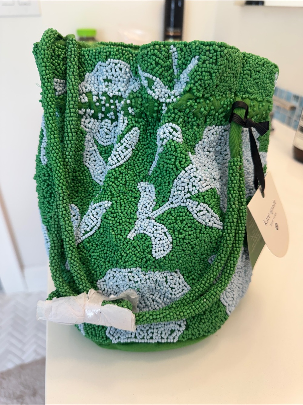 kate spade Green and White Beaded Floral Drawstring Crossbody Bag